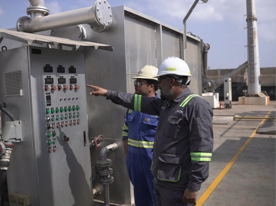 Workers at industrial facility